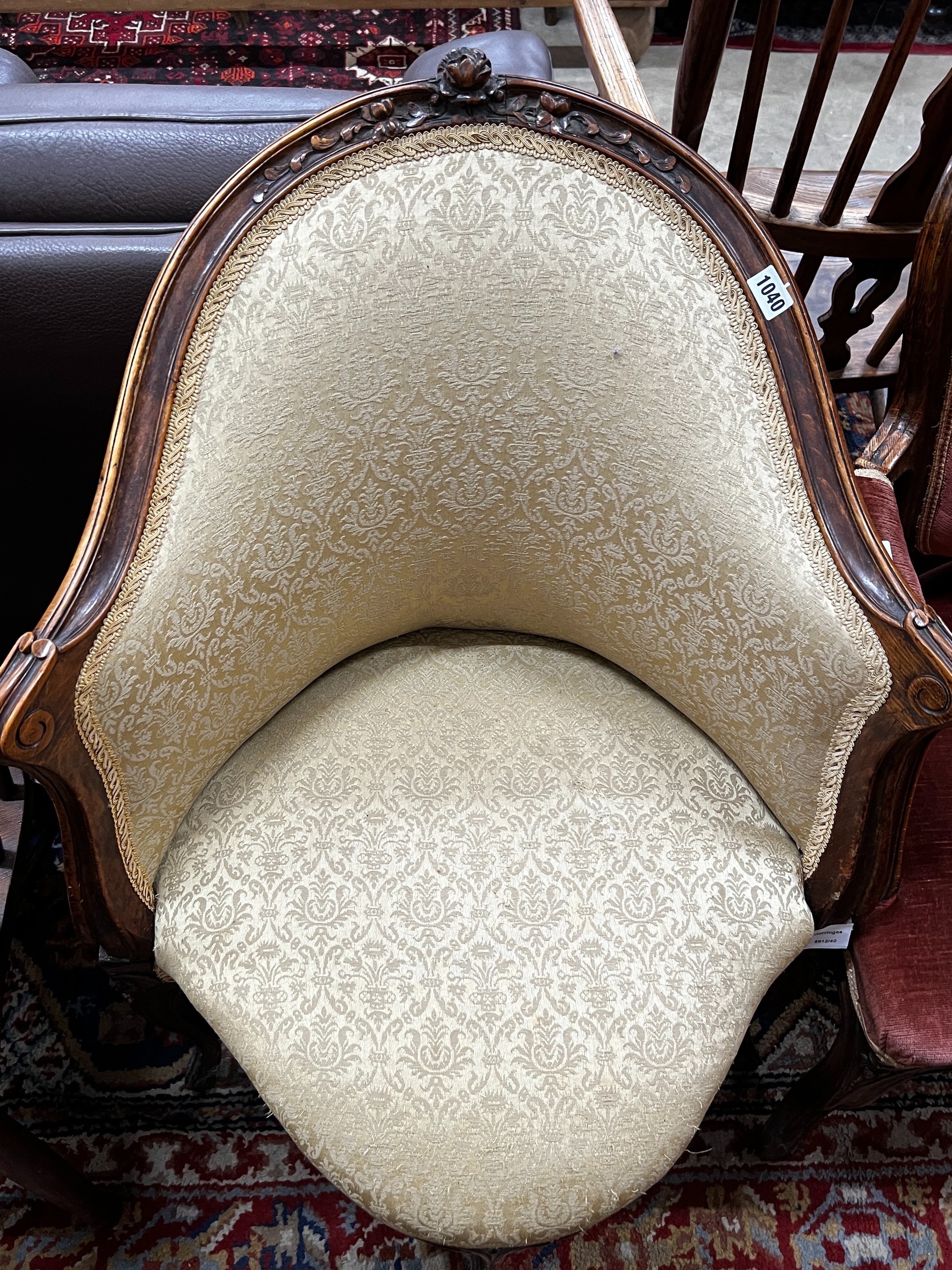 A late 19th century French walnut corner elbow chair, width 65cm, depth 49cm, height 90cm